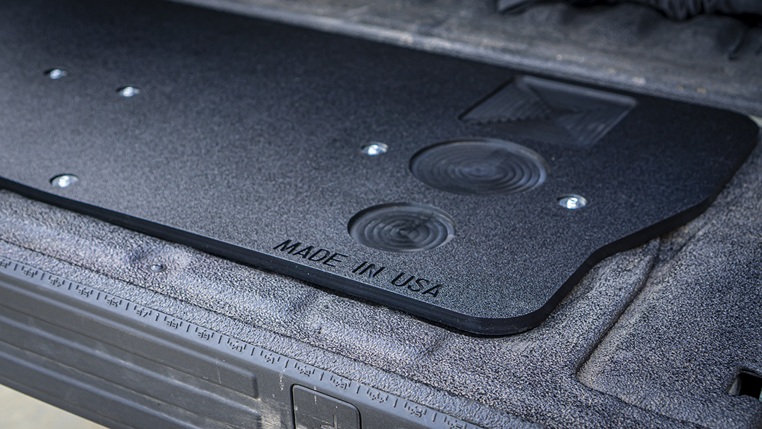 Detail of the drink holders and MADE IN USA stamp on the Mountain Hatch 2024+ Ranger panel