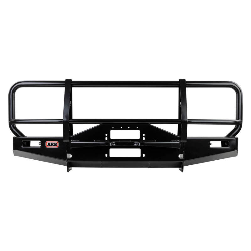 ARB Deluxe winch bull bar fitted to a 1994-1997 Land Rover Defender 90 — front three-quarter view