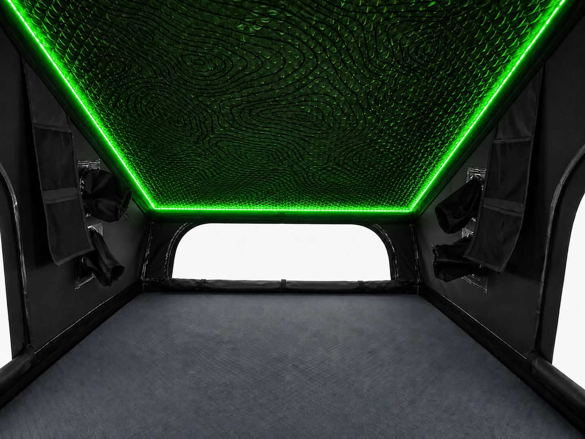 Interior of the Dark Rogue tent with green LED ceiling lighting