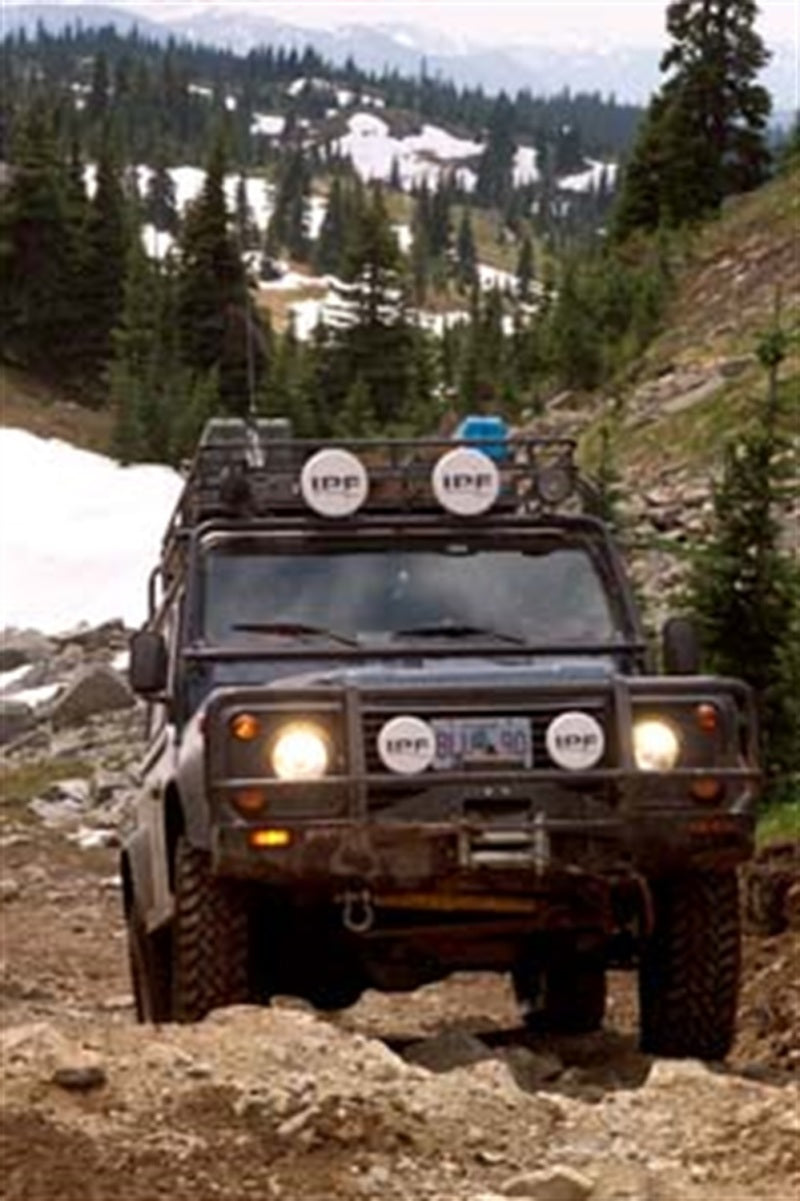 ARB winch bull bar fitted to a Land Rover Defender 90, front three-quarter view