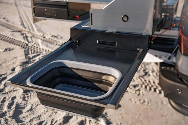ARB Slide Kitchen stowed showing utensil drawer and compact footprint