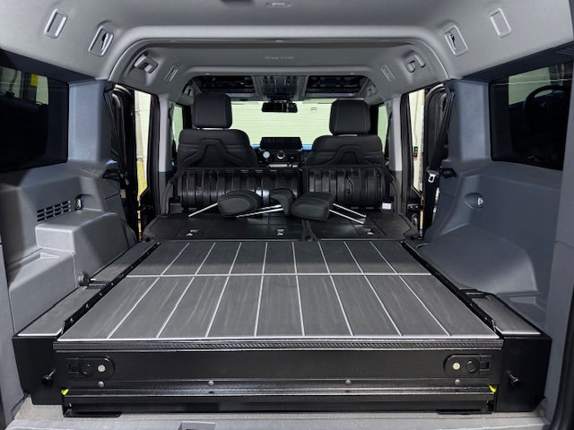 Rear view of the Grenadier drawer with leveling panels and foam deck
