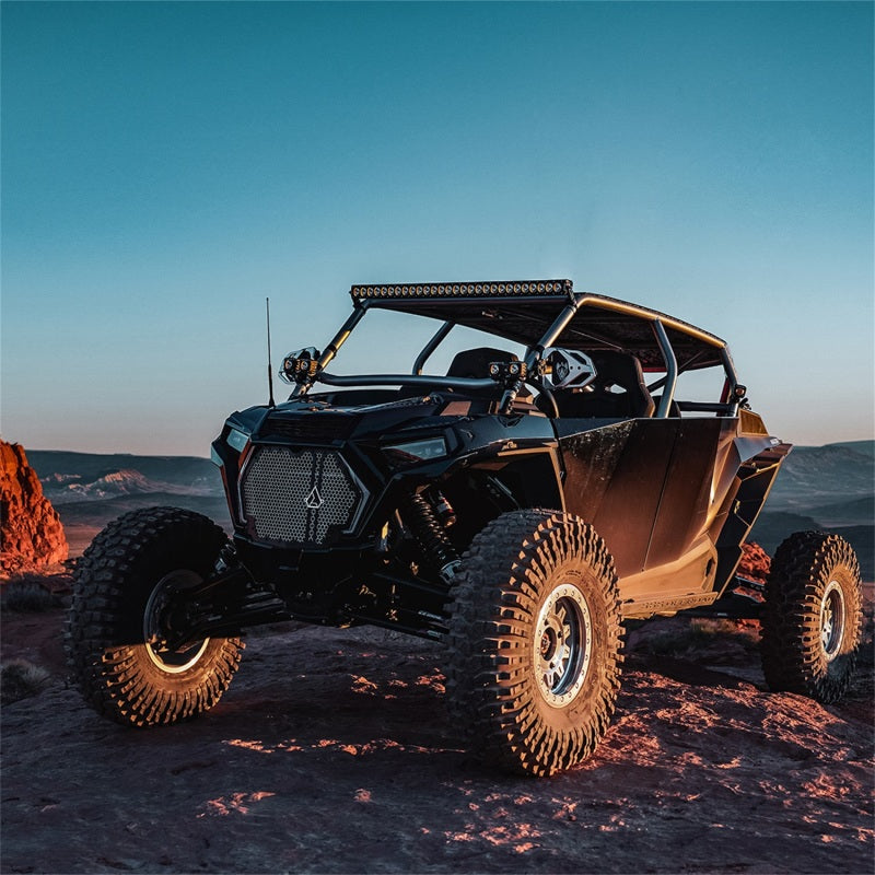 Rigid Revolve 30in light bar main Broad-Spot beam projecting down a dark trail