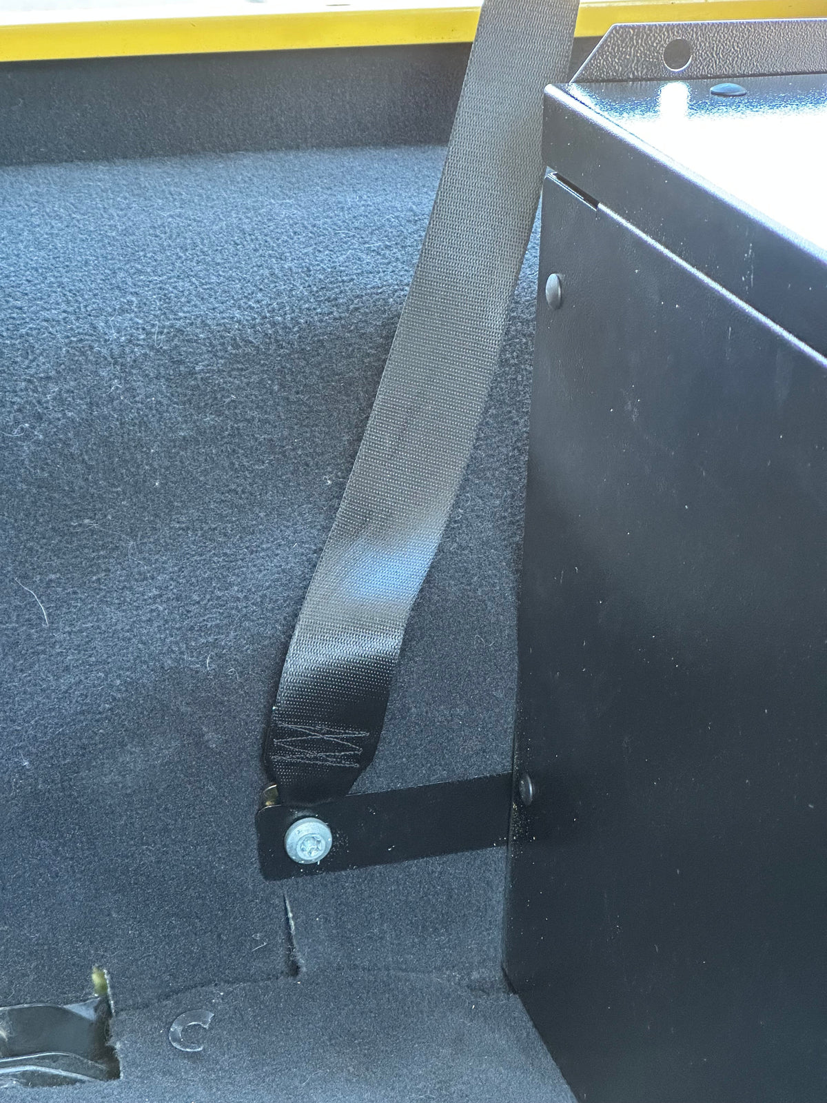 Ridgeback side panel with the rear seat belt routed past it