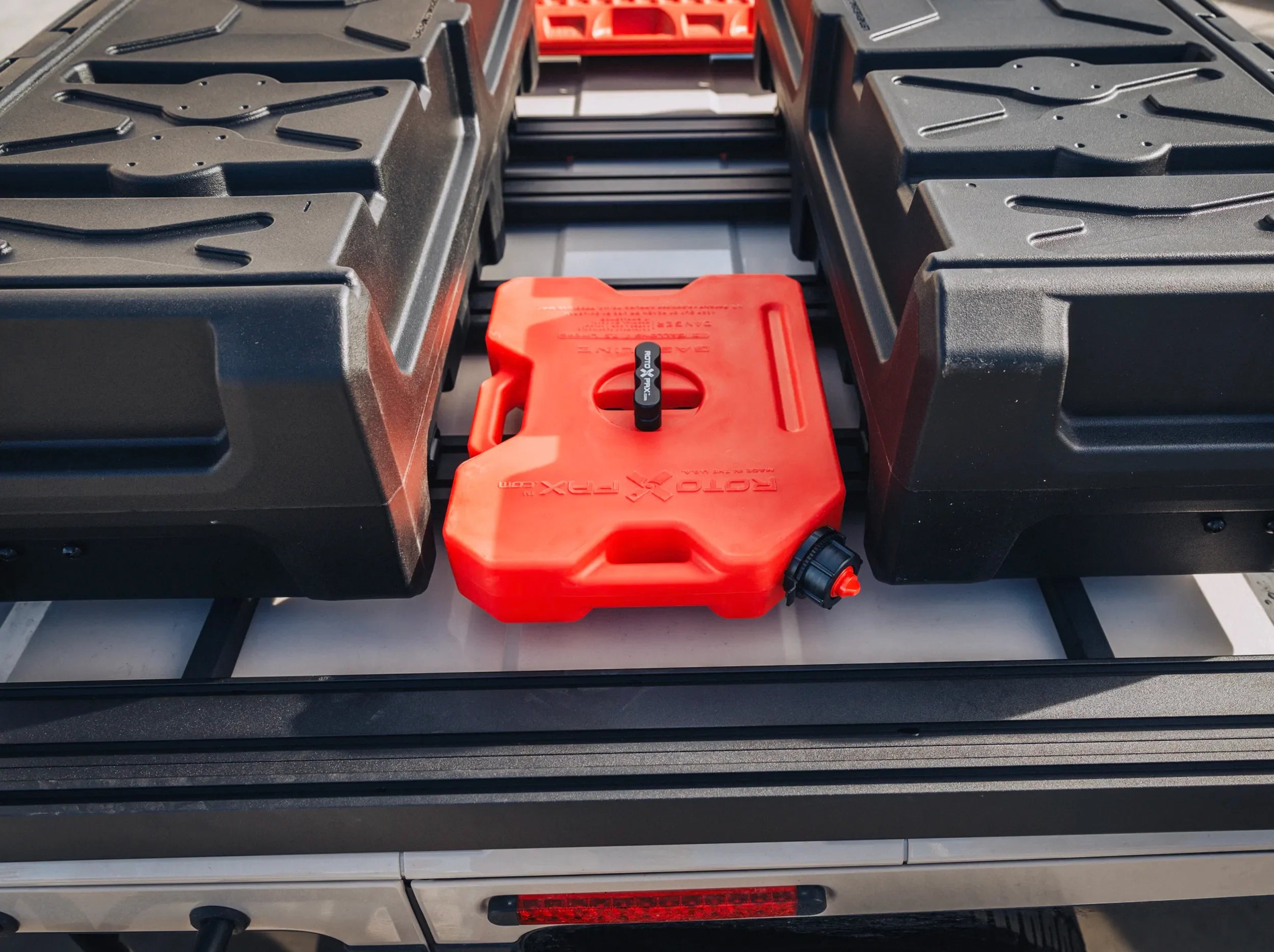 ABOVE VIEW OF ROTOPAX MOUNTED ALONG WITH GEARPOD ROOFS MOUNTED ON ACS ROOF RACK