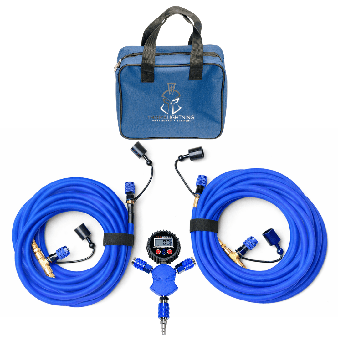Hero shot of the blue Rapid Multi-Tire Air System kit with carrying bag, coiled hoses, and Standard Hammer Manifold