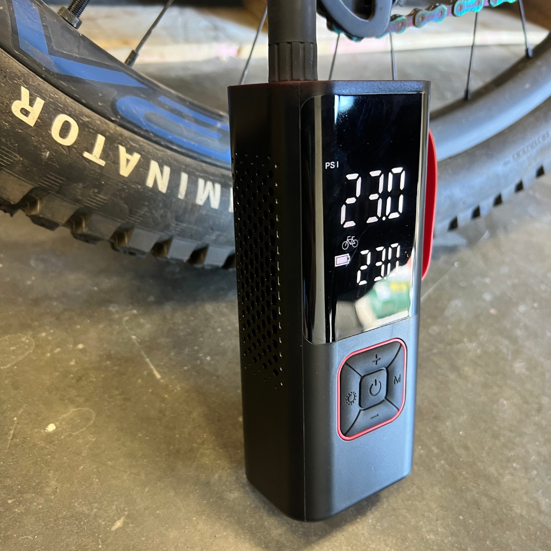 Lifestyle photo of the AirSpark compressor being used outdoors