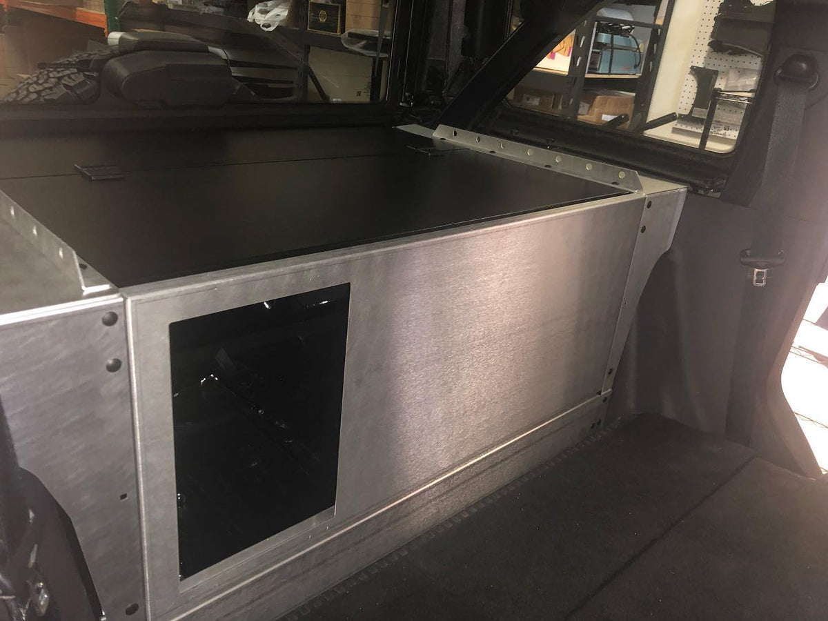 Raw aluminum Slipstream wing skin with an access cutout in a Bronco