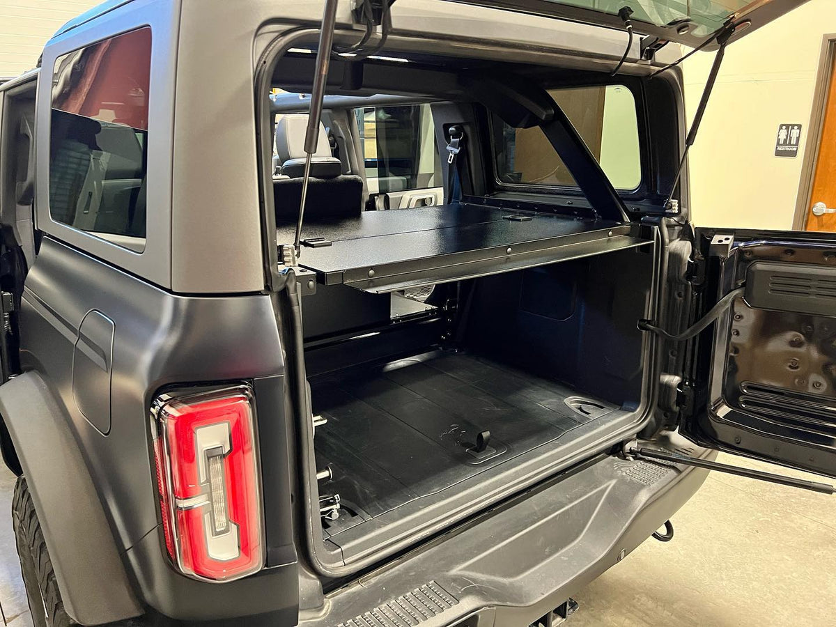 Bronco 4-door from the rear quarter showing the Slipstream with the top lifted