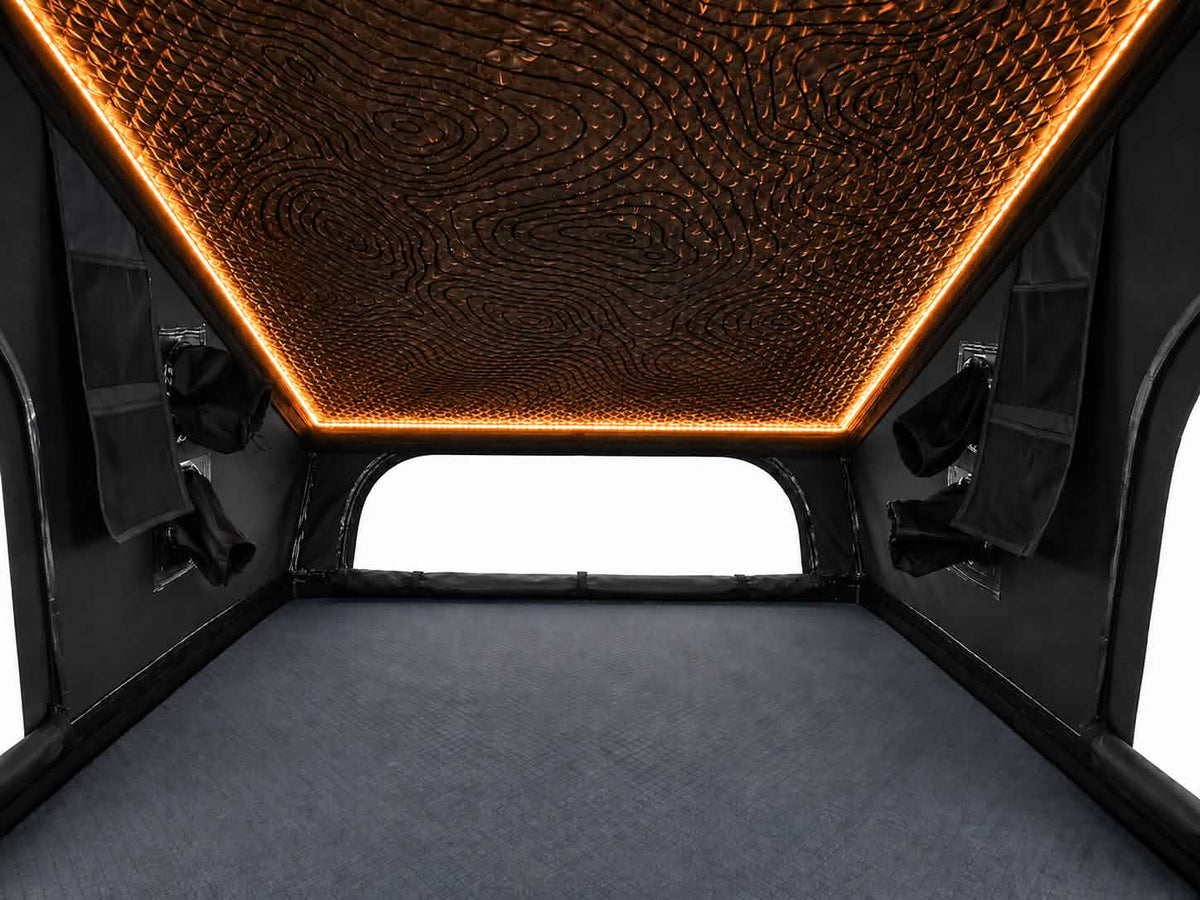 Interior of the Dark Rogue tent with orange LED ceiling lighting