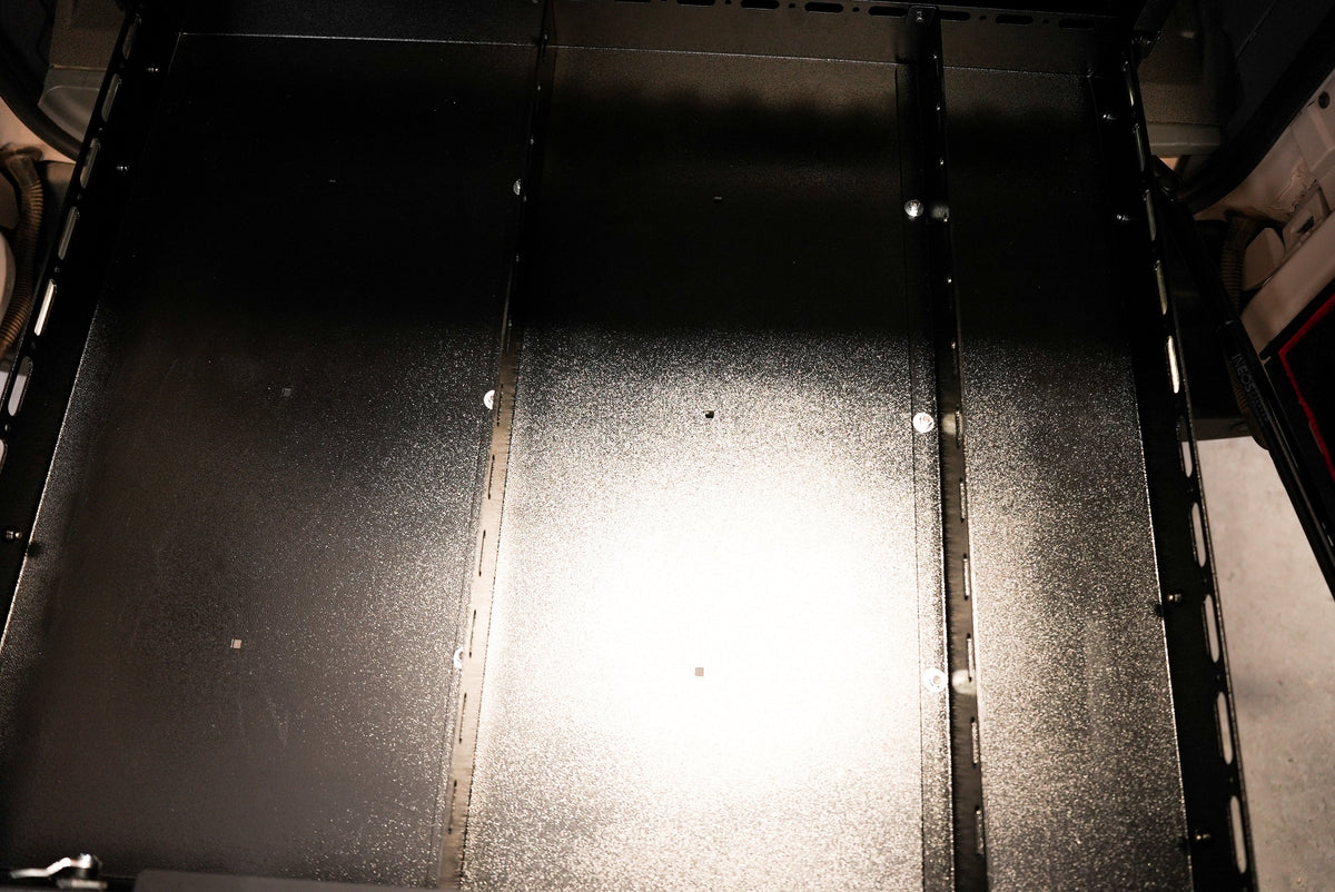 Top-down view of the Grenadier tray surface and bolt-in divider
