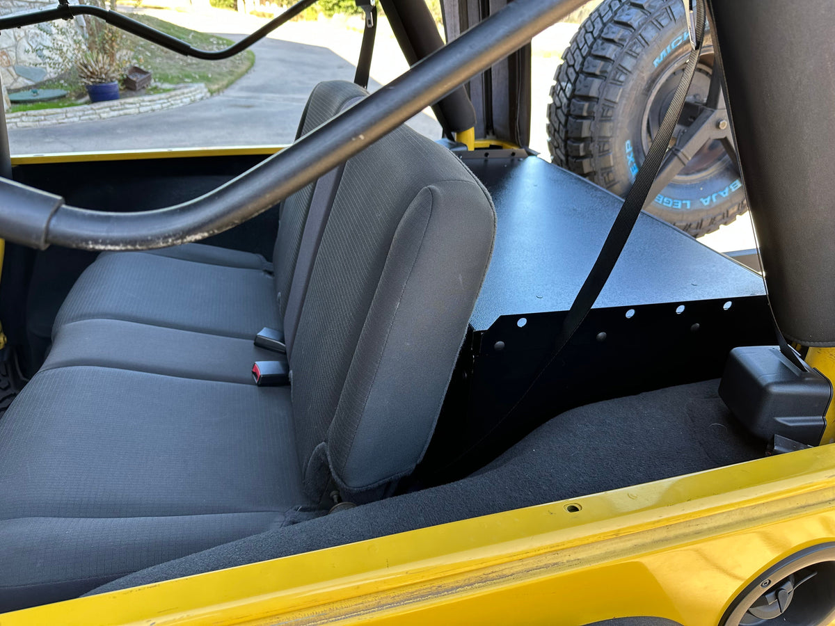 Yellow LJ with the top off, Ridgeback Basic visible behind the rear seat