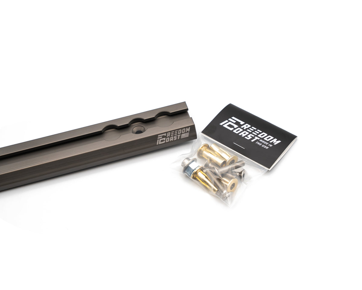 Ford Freedom Track rail laid next to its cross nut and bolt kit