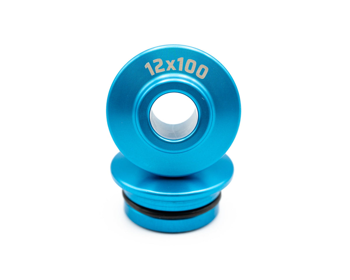 Blue 12x100 road and gravel fork mount adapter