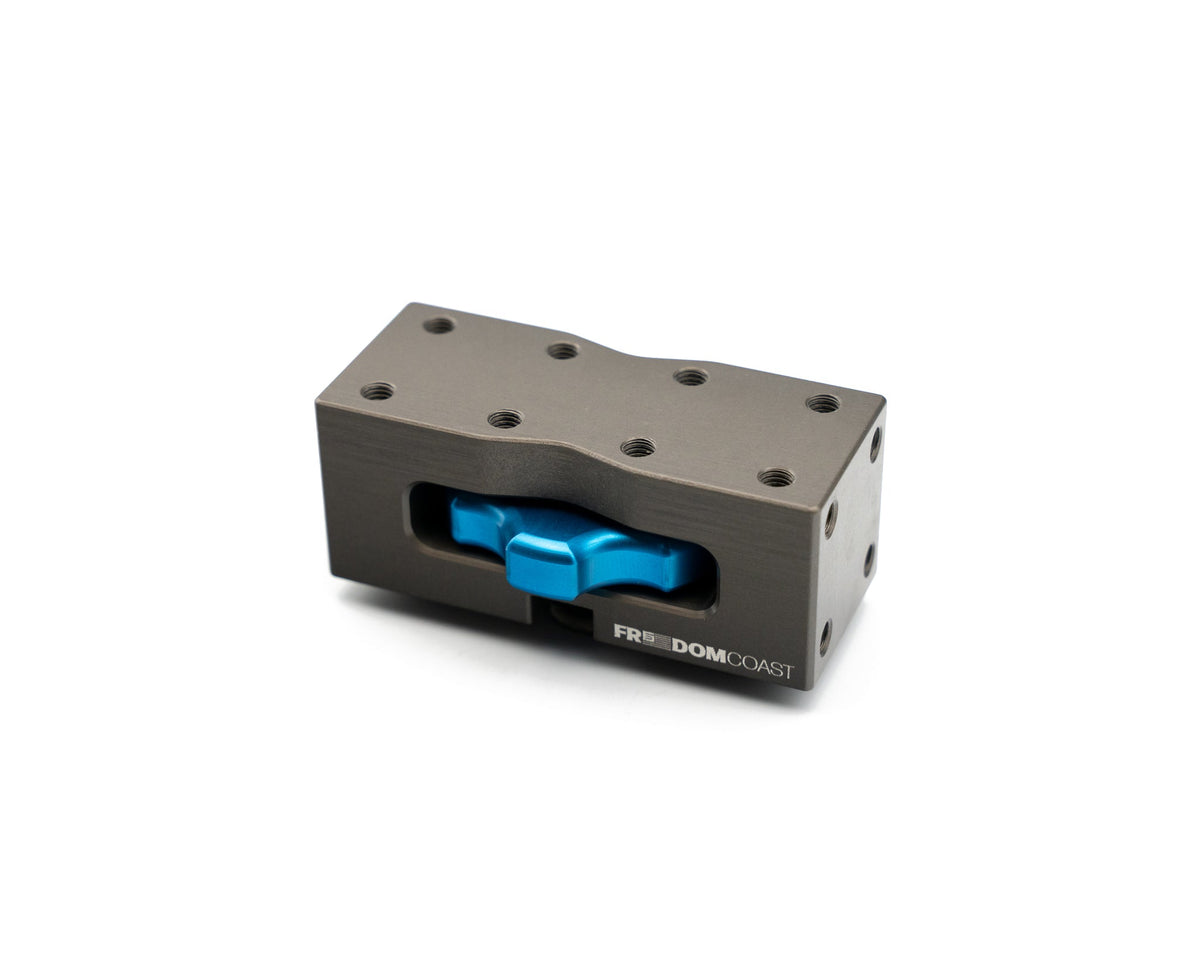 Freedom Coast MODmount base with blue quick-release knob, front angle