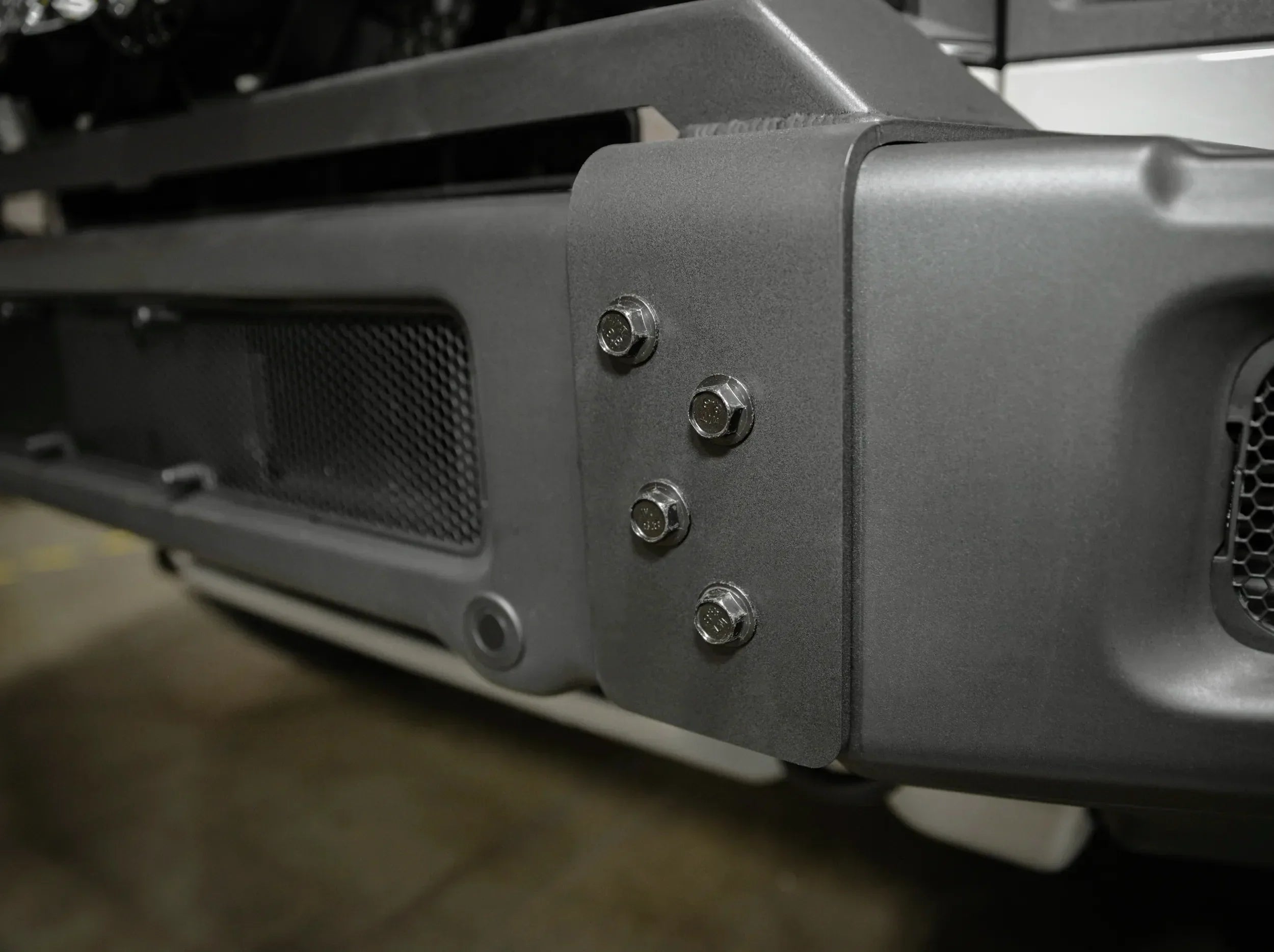 Grenadier front bumper light bar bracket side view