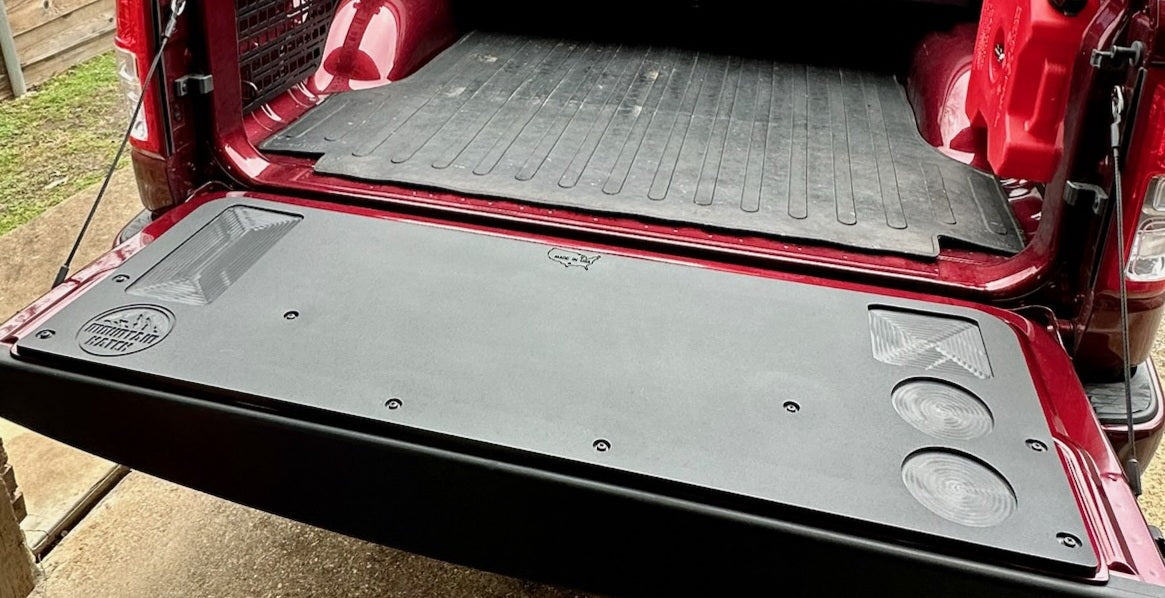 Mountain Hatch recessed-pocket tailgate table installed on a red 1999-2006 Toyota Tundra tailgate
