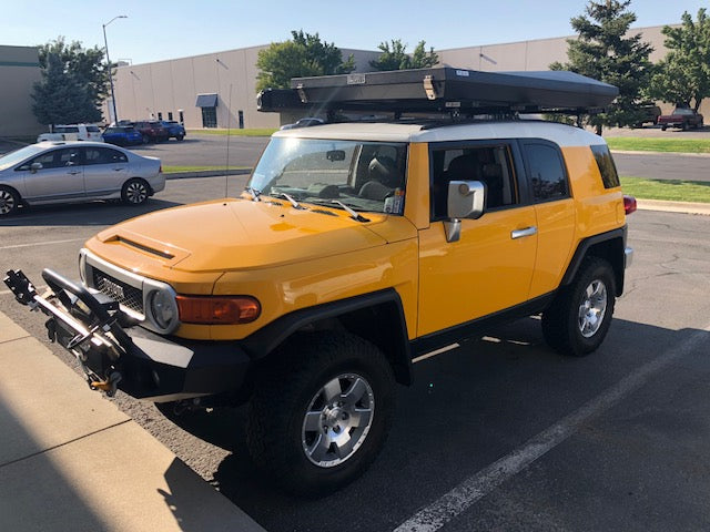 Toyota FJ Cruiser with roof top tent on K9 load bars, front view