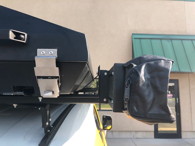 Accessory bracket attached to a K9 load bar