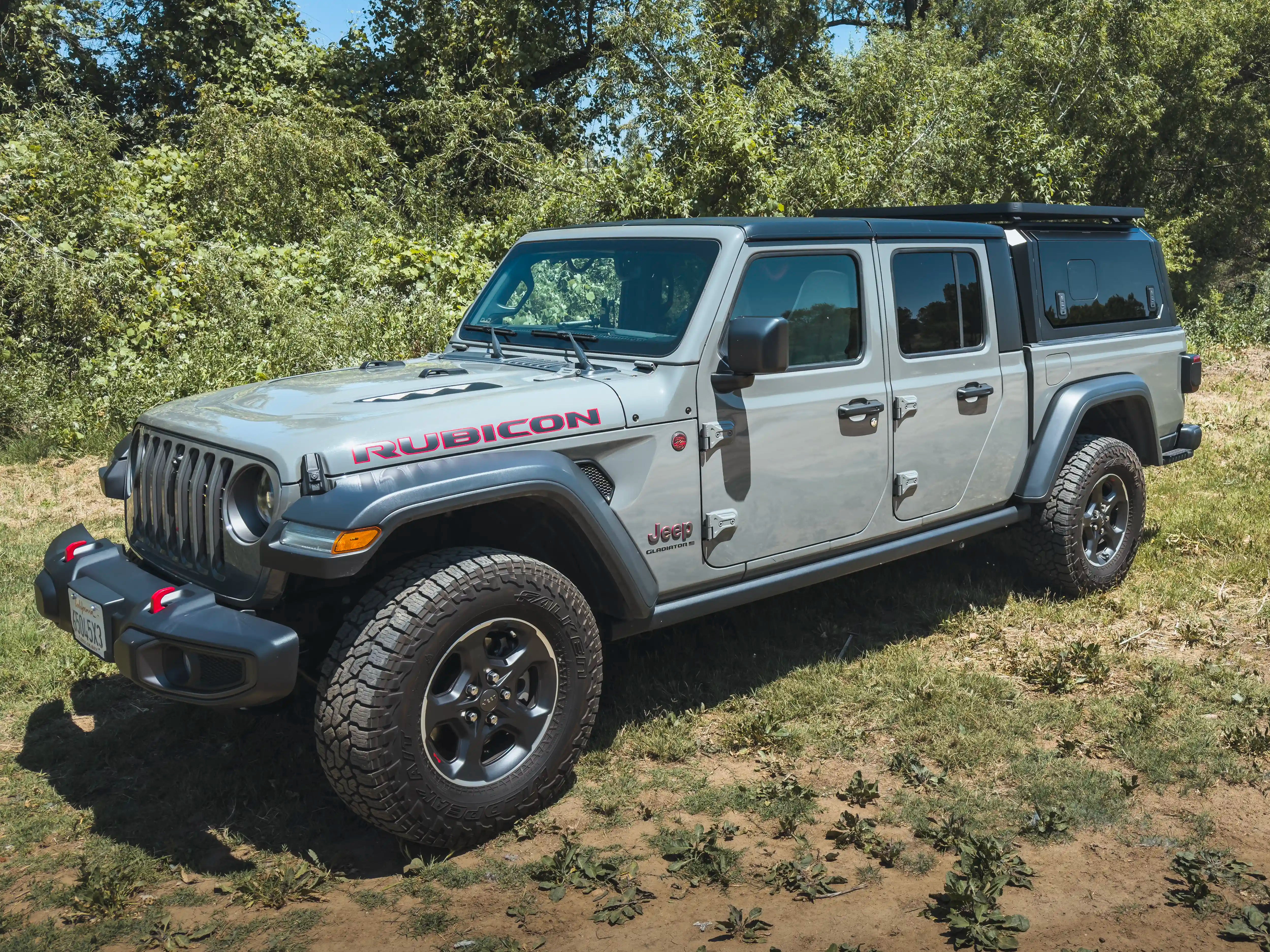 Truck with ACS Roof Platform on SmartCap navigating rugged terrain, emphasizing durability and off-road readiness.