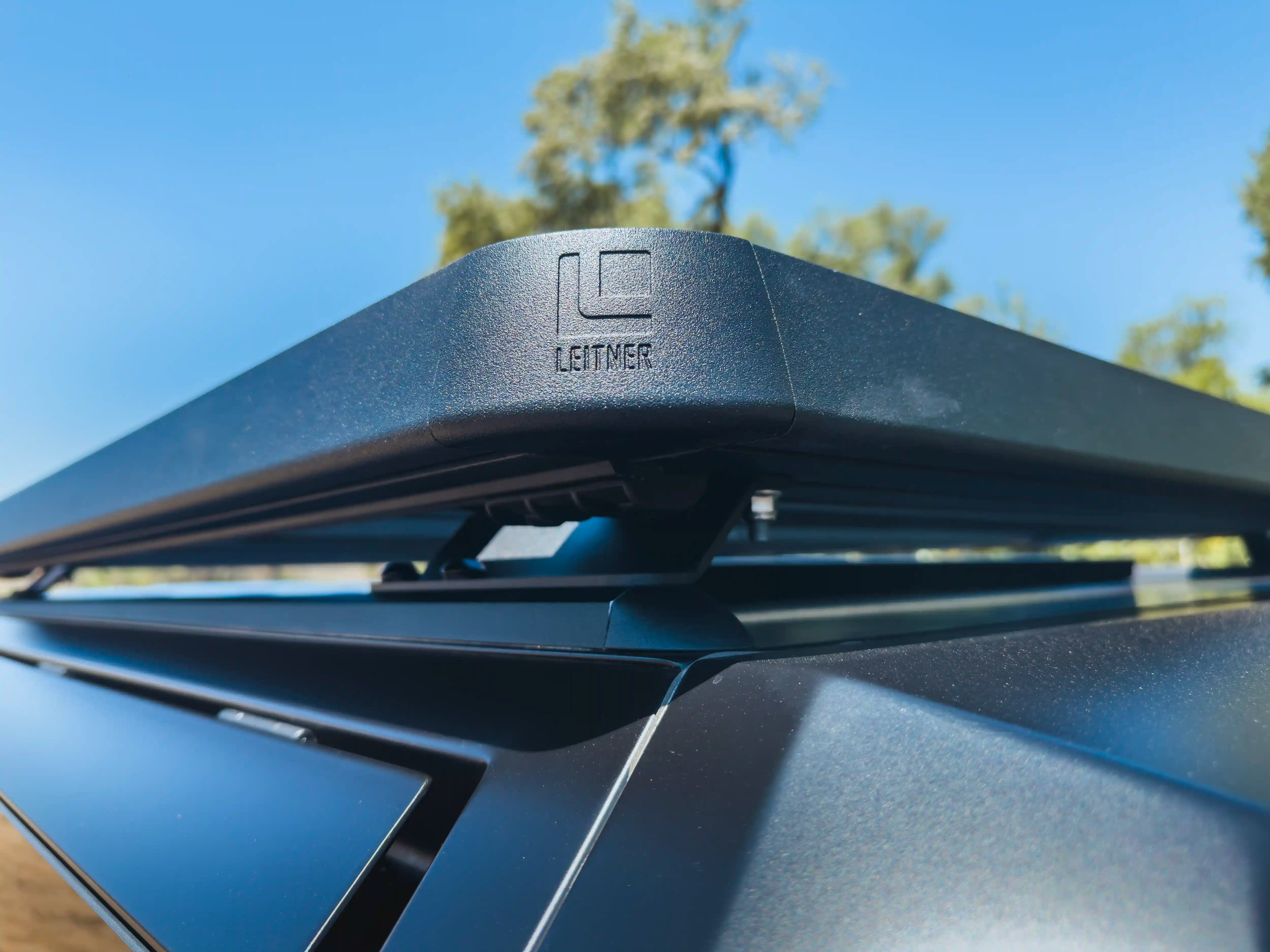 Truck with ACS Roof Platform on SmartCap navigating rugged terrain, emphasizing durability and off-road readiness.