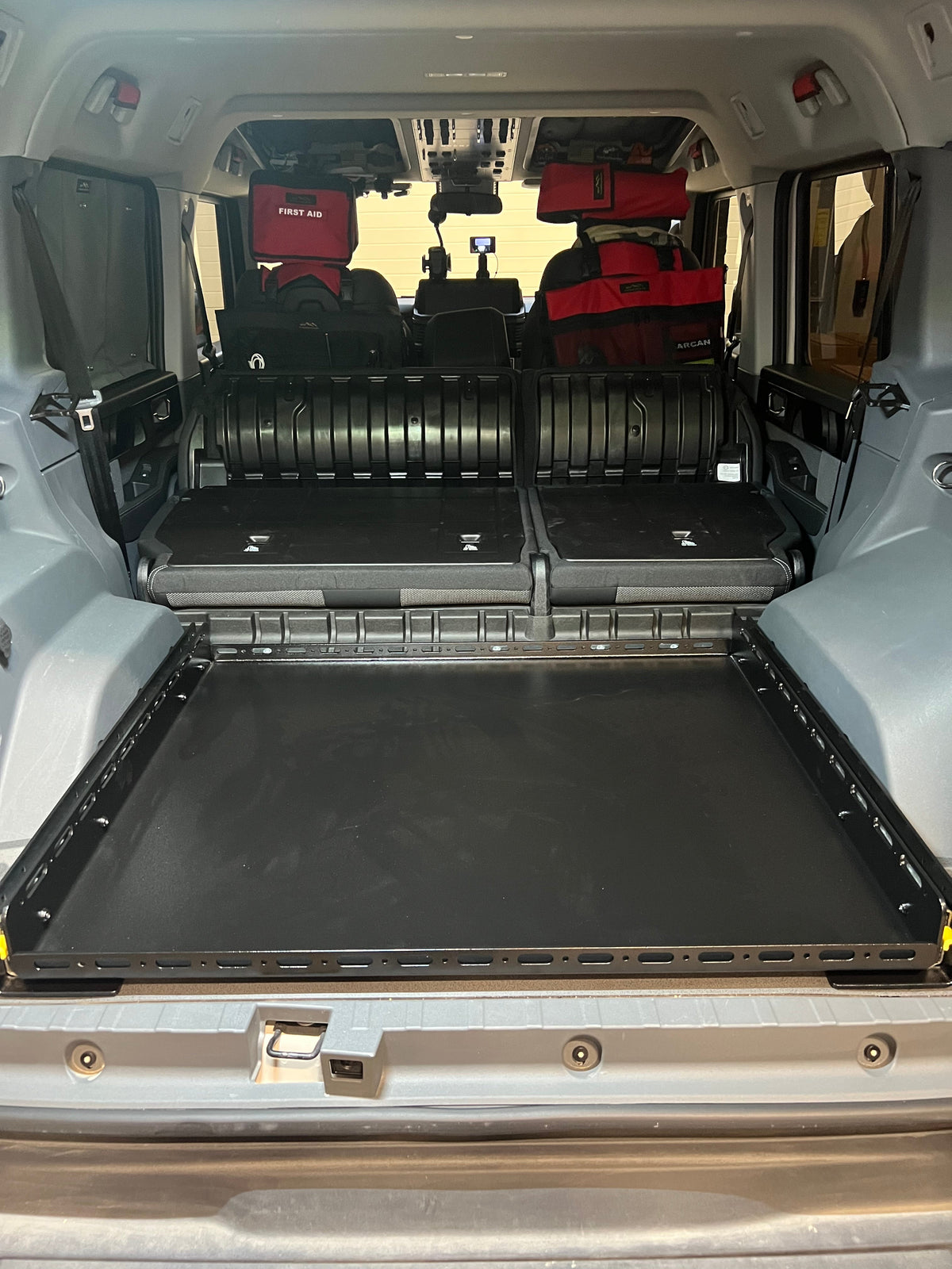Grenadier slide floor retracted in the cargo area