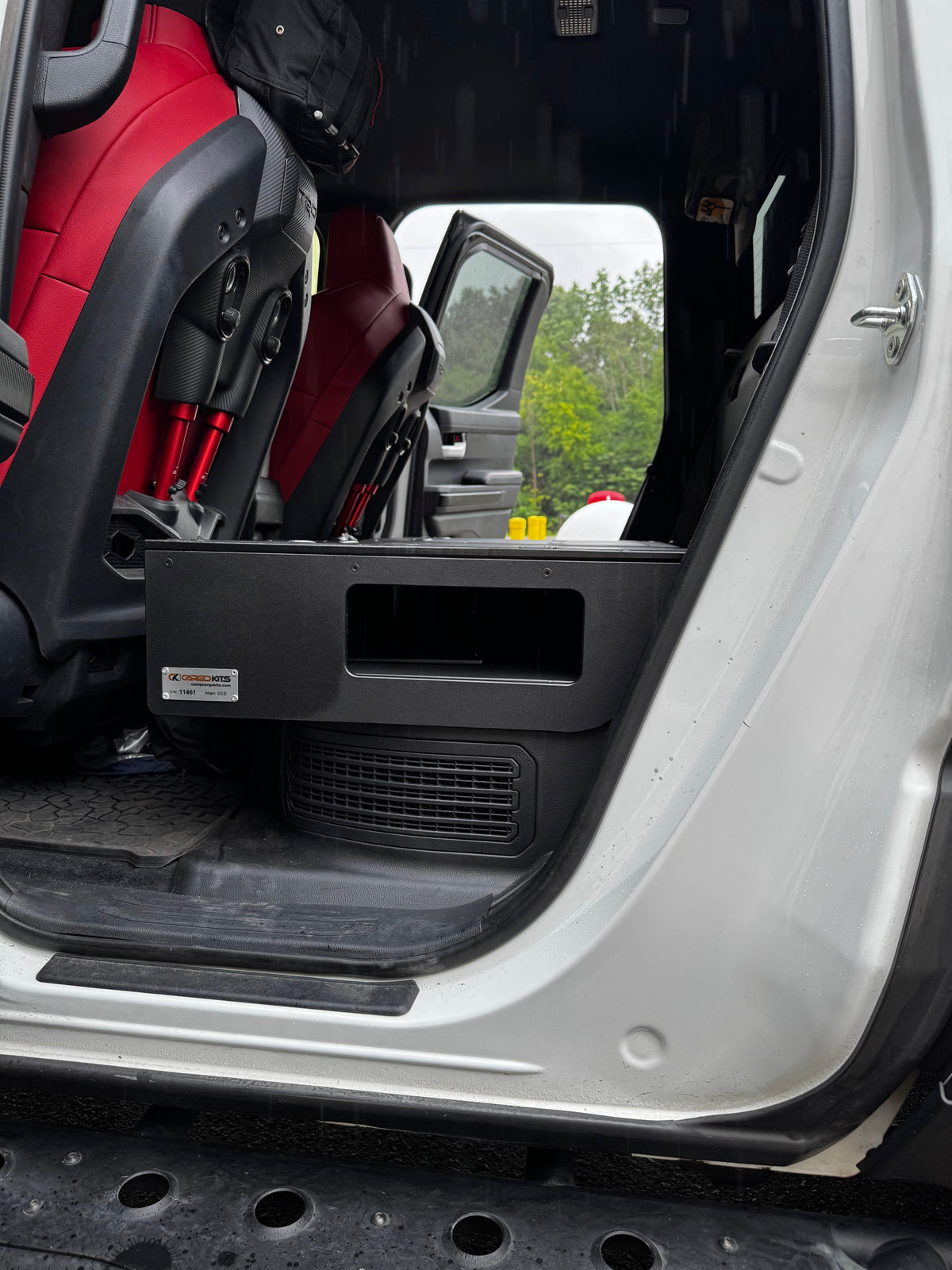 CargoKits Rear Seat Delete in a Tacoma TRD Pro Hybrid, real install photo showing panel seams