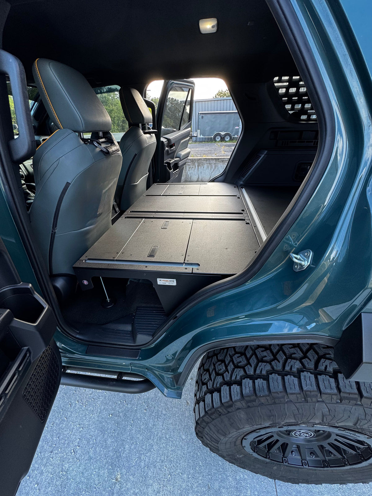 CargoKits Base Plate System in a 4Runner Hybrid, view showing the Seat Delete section access panel