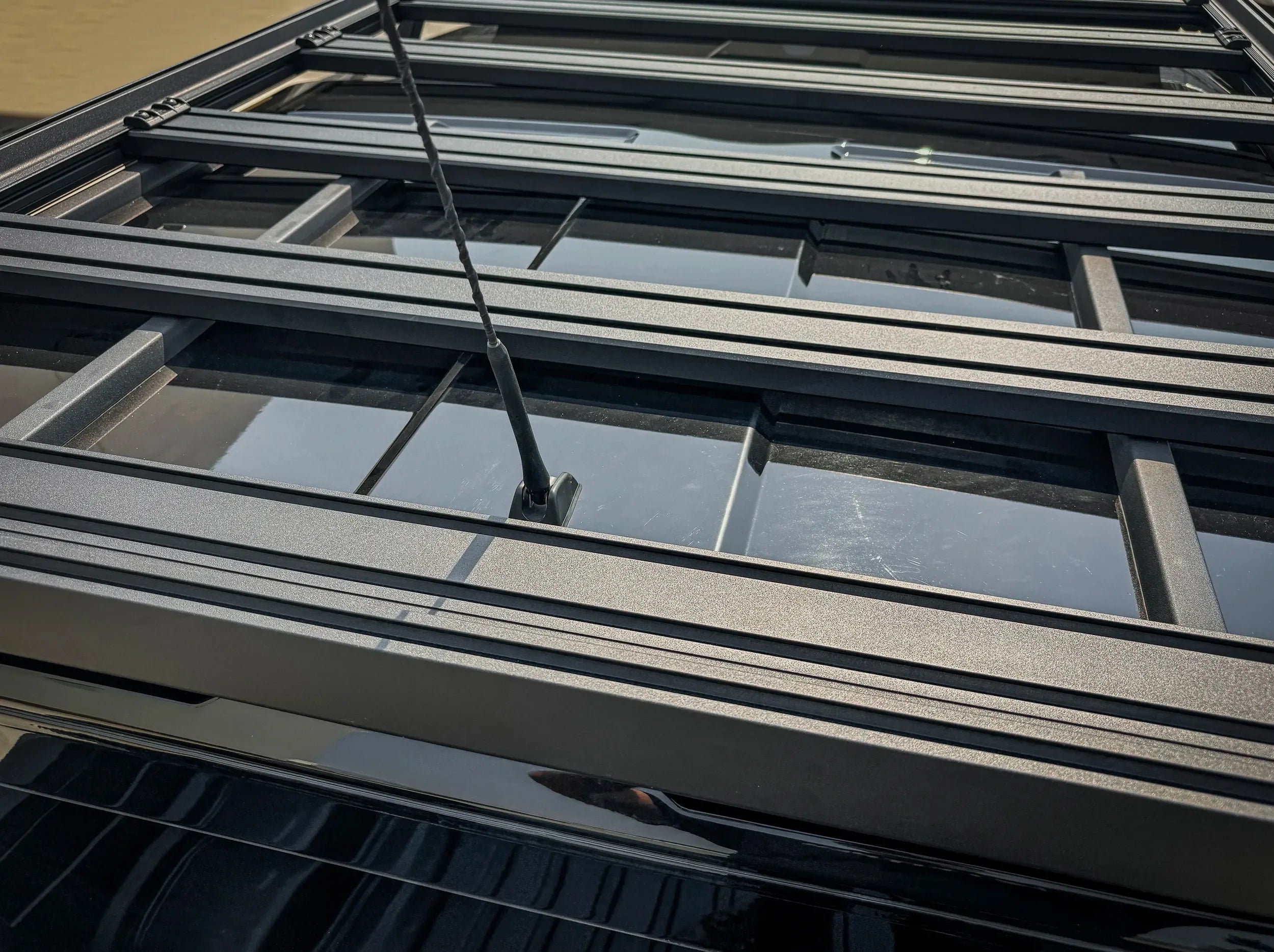 CLOSE UP OF FULL LENGTH ACS ROOF LOAD BARS