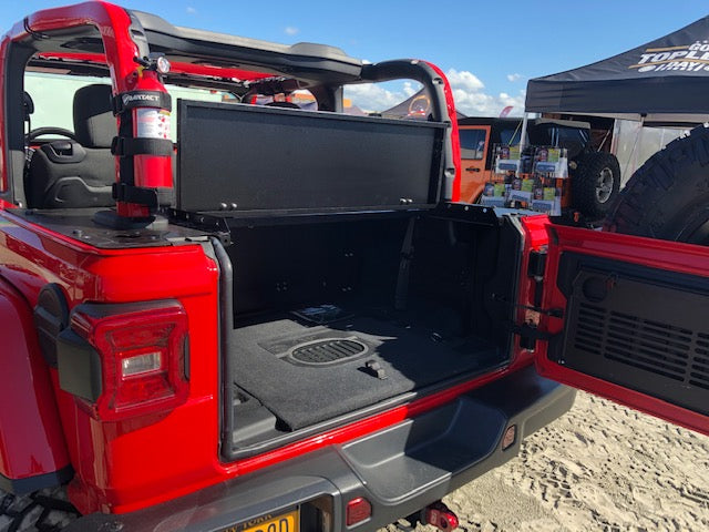 Rear of a red JL 2-door with the Slipstream top folded up over the cargo area