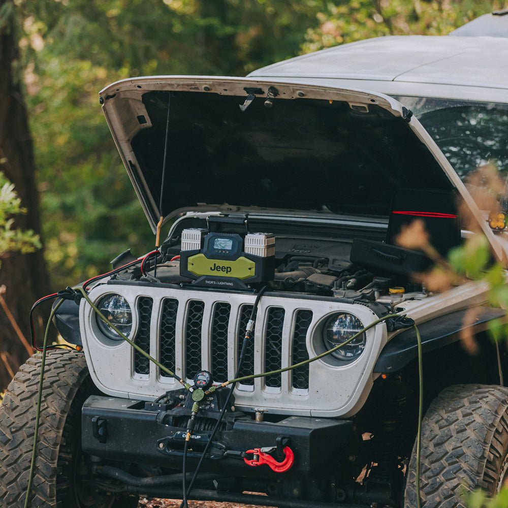 Jeep Rapid Multi-Tire Air System's manifold and hoses connected under the hood of a Jeep Wrangler