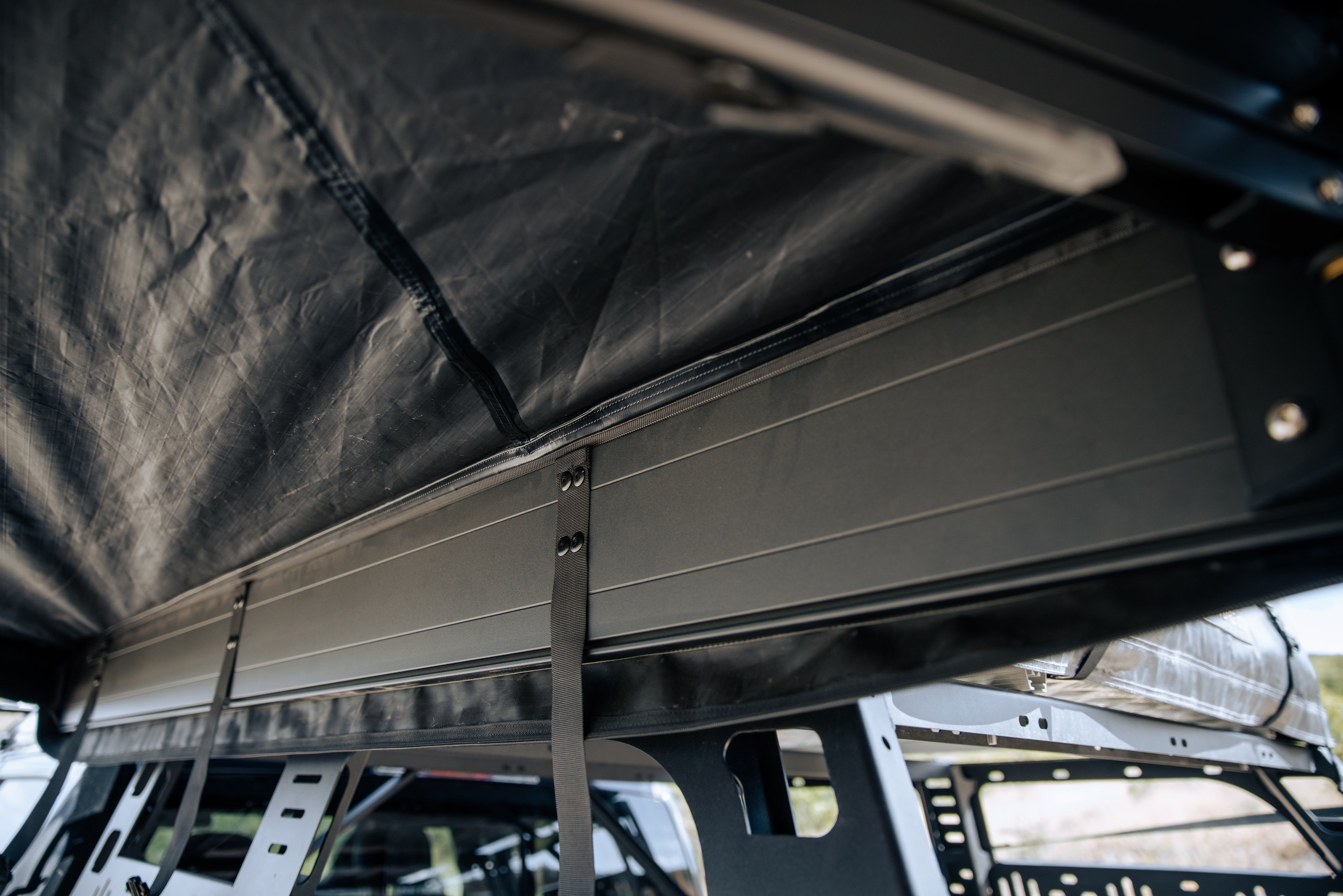 ROAM ARC 270 awning providing shade for campers