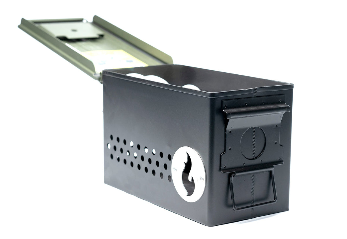 Olive green steel firebox shown open with its hinged lid raised, studio shot on white background