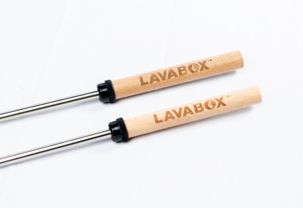 Two wooden-handled steel roasting fork skewers branded LAVABOX, studio shot on white background