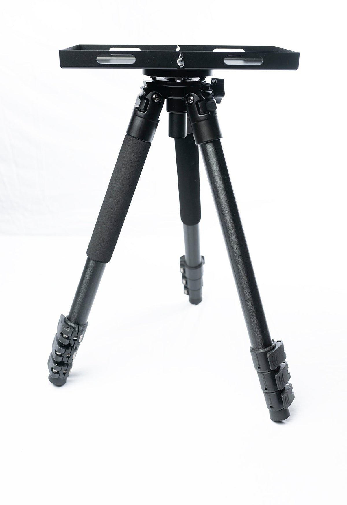 Daddy Long Legs black tripod stand with a flat mounting plate on top, studio shot on white background