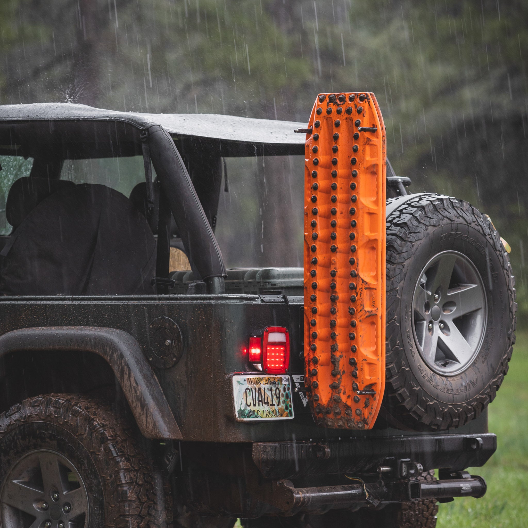 Maxtrax xtremes mounted on the Overland Kitted Spare Tire Mount on a Jeep