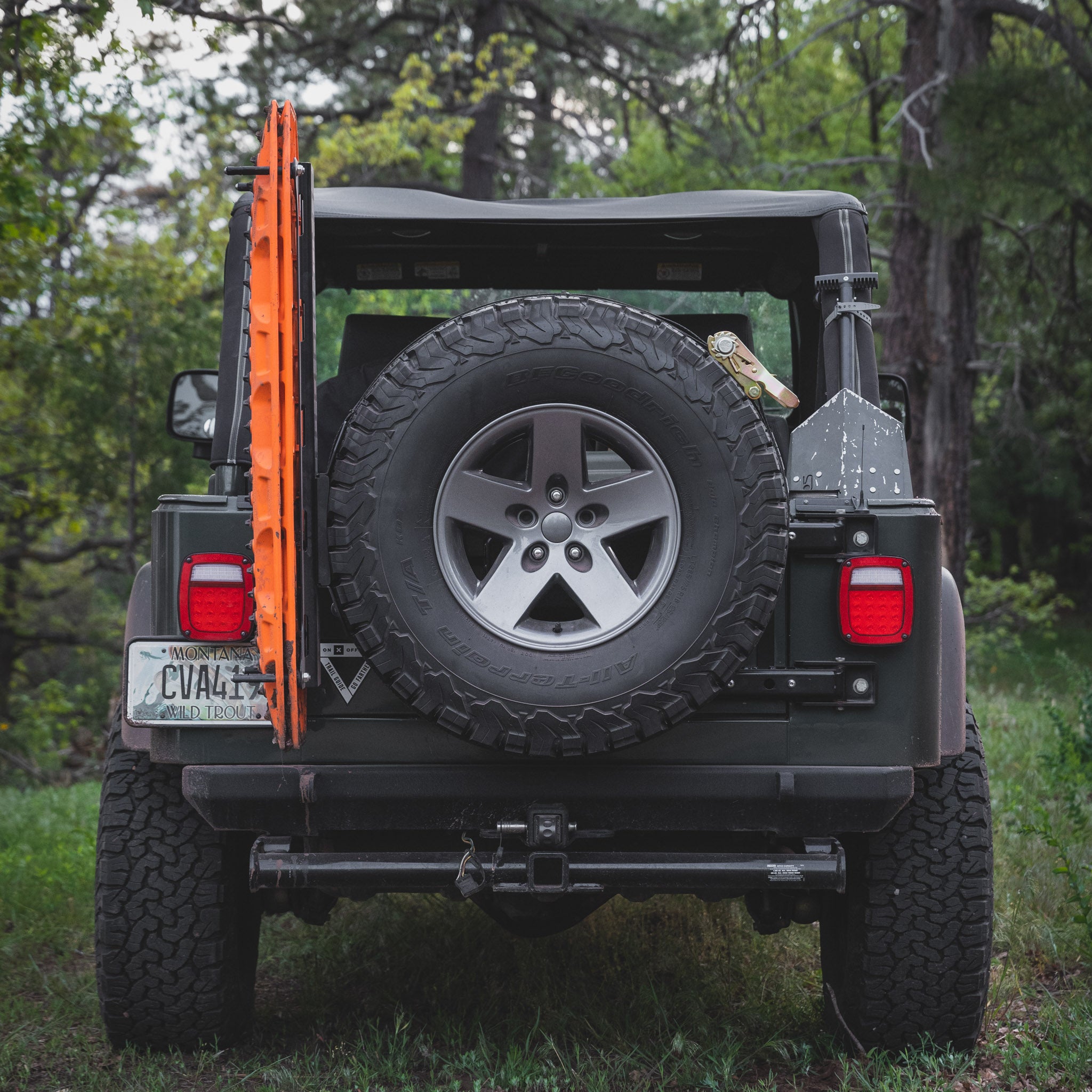 Maxtrax xtremes mounted on the Overland Kitted Spare Tire Mount on a Jeep