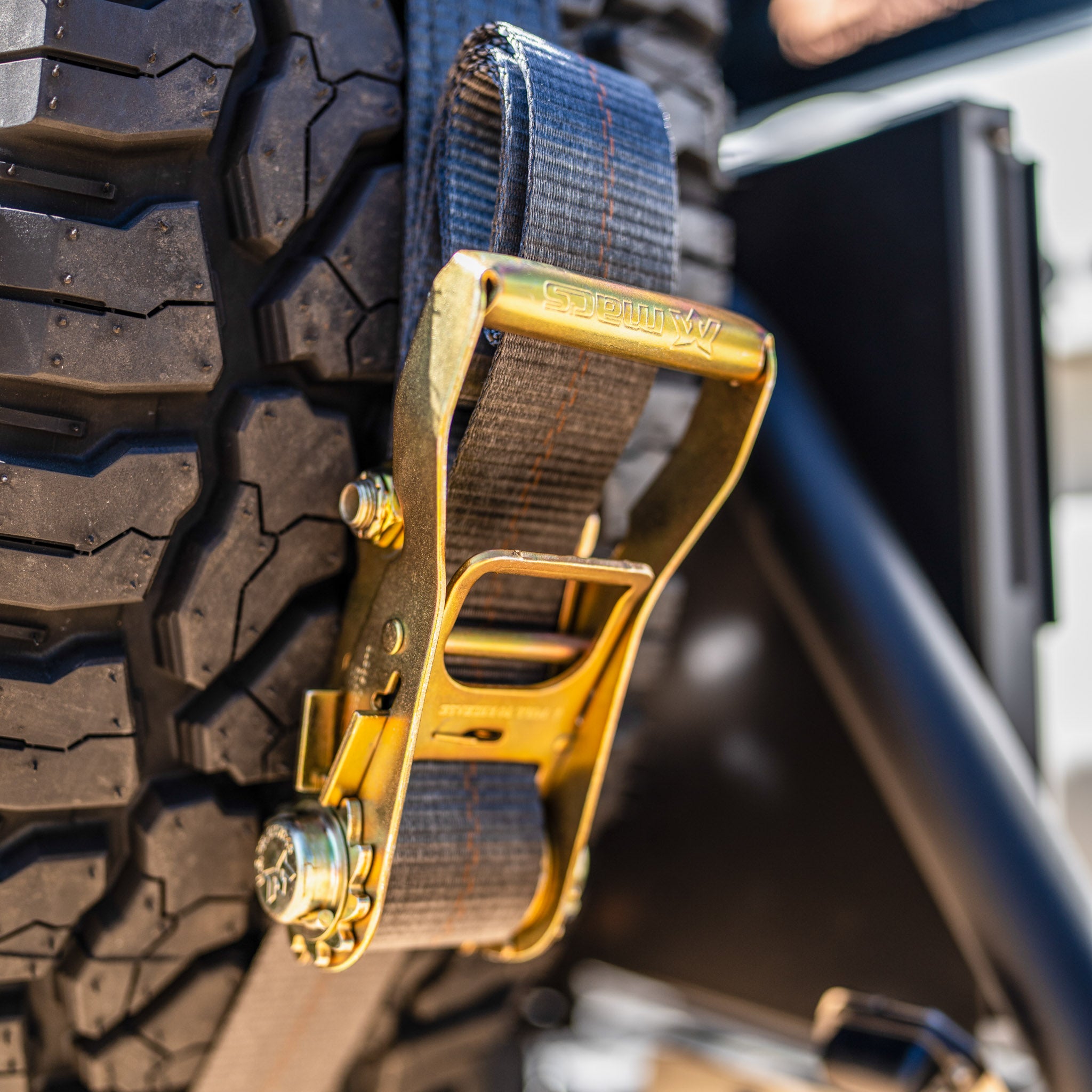 Detail of the Mac's strap on a tire