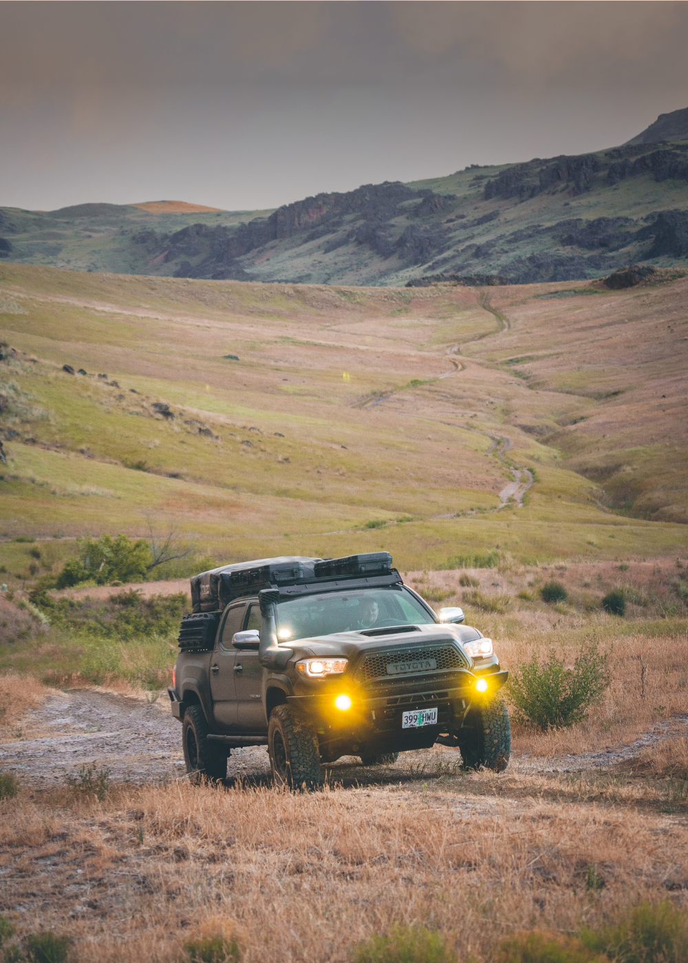 Toyota Tacoma Built For Overland Travel Featuring Baja Designs Squadron Pro Fog Lights In Amber.