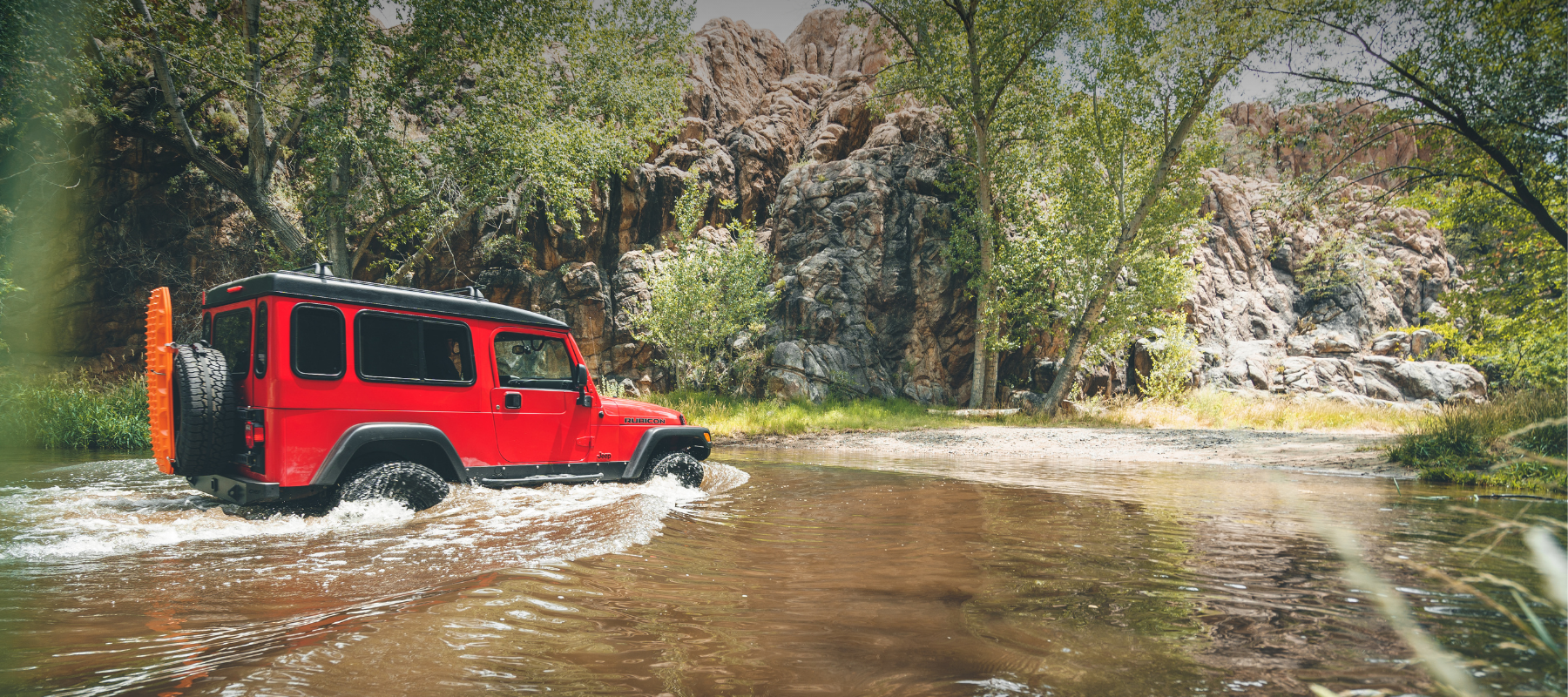 Safari Jeep Rubicon LJ with Gr8tops In Water Crossing