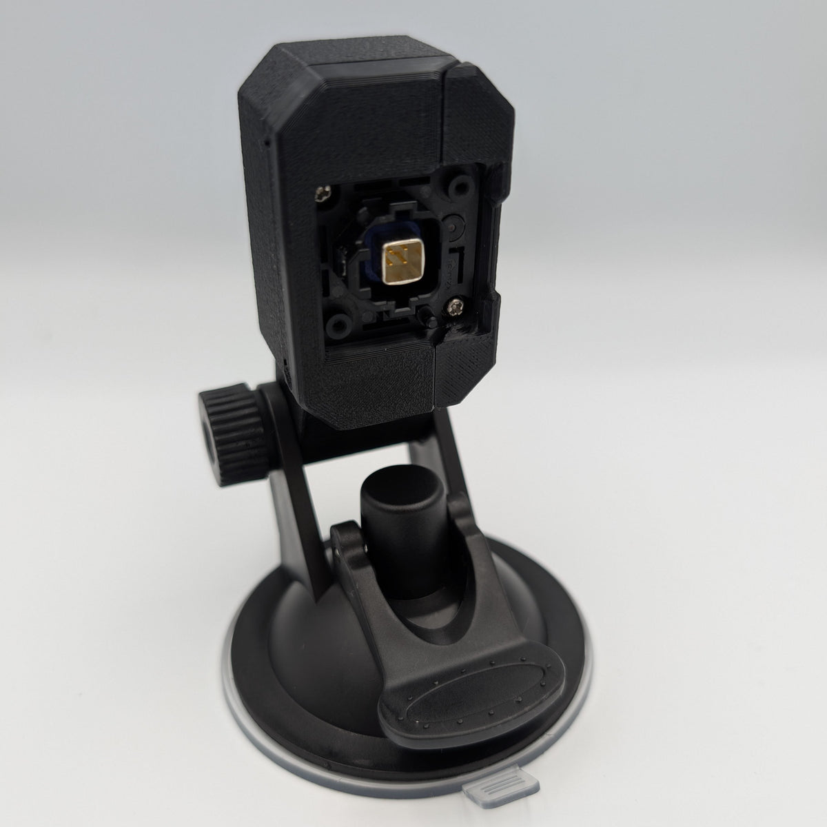 Rear of a GG Offroad suction mount camera housing with connector opening