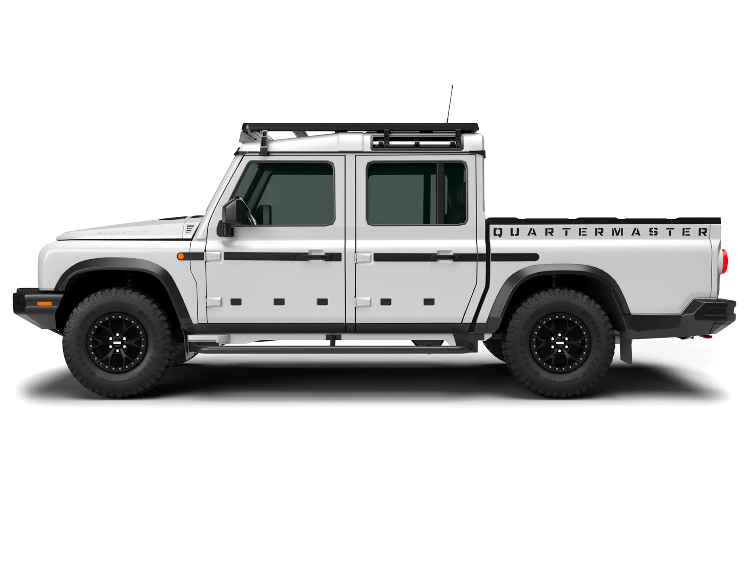SIDE VIEW OF GRENADIER QUARTERMASTER TRUCK WITH FULL LENGTH ACS ROOF RACK 