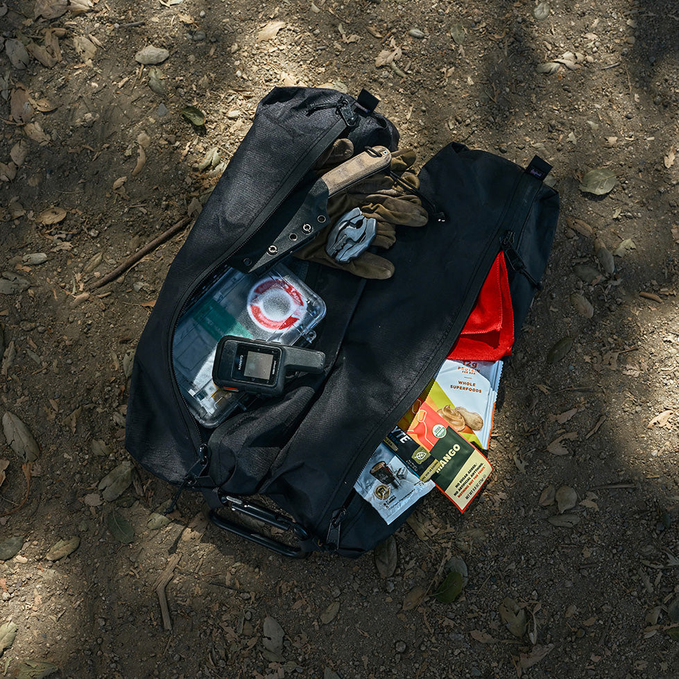 Colfax Equipment Module — UL open on the trail with gloves, tools, and snacks packed inside