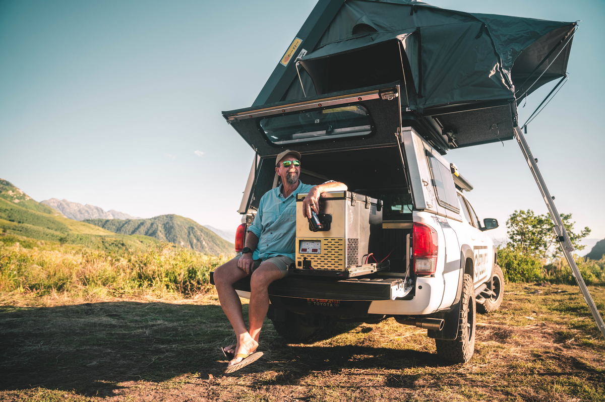 National Luna fridge at a truck tailgate campsite