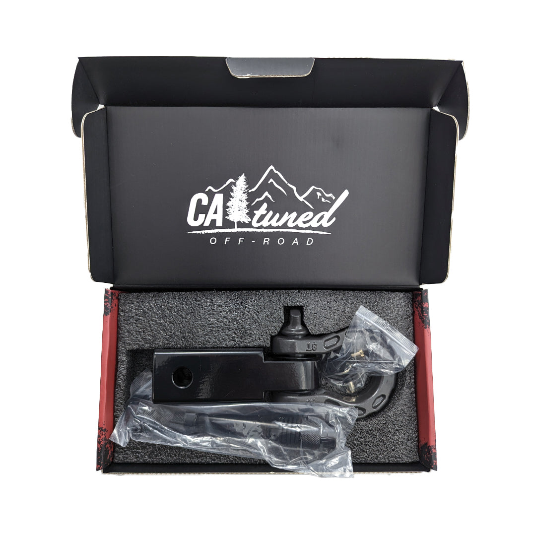 Open box holding the shackle hitch receiver