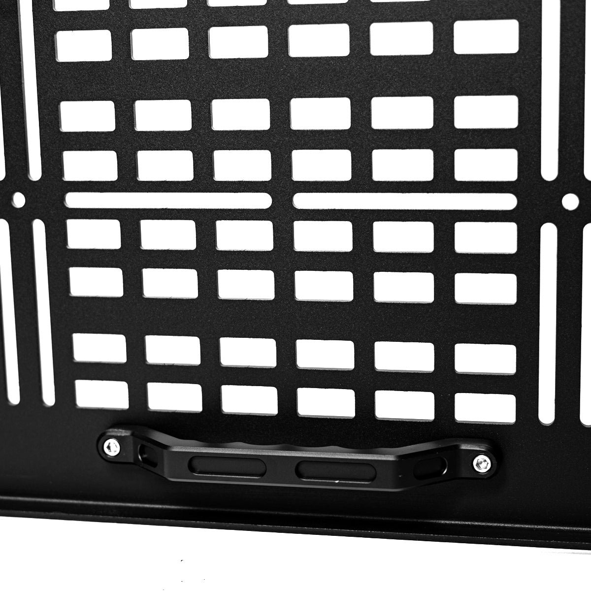Close view of the MOLLE-cut hatch door with its handle at the bottom edge