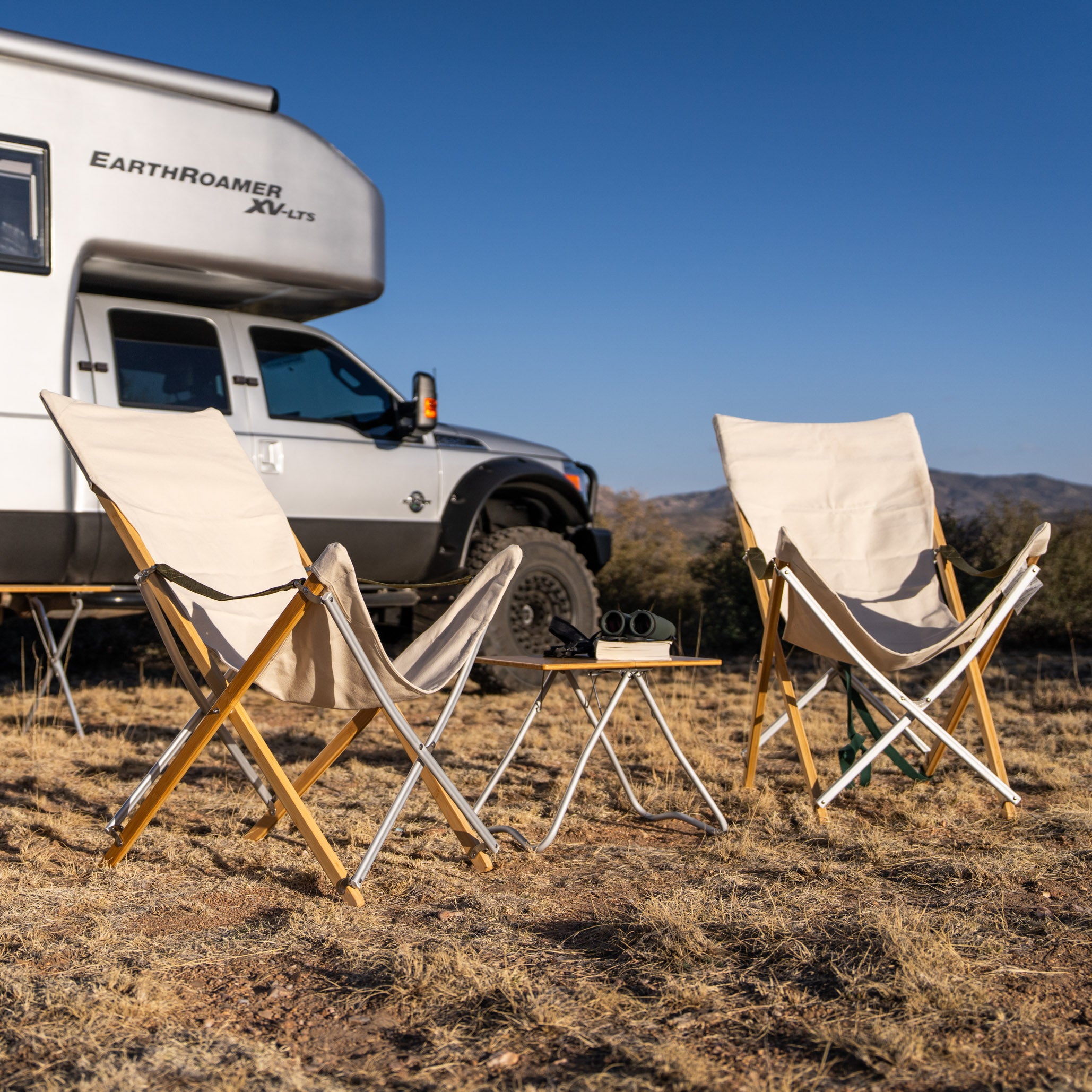 Snow Peak Take! Bamboo Long Chair in campsite with overland truck