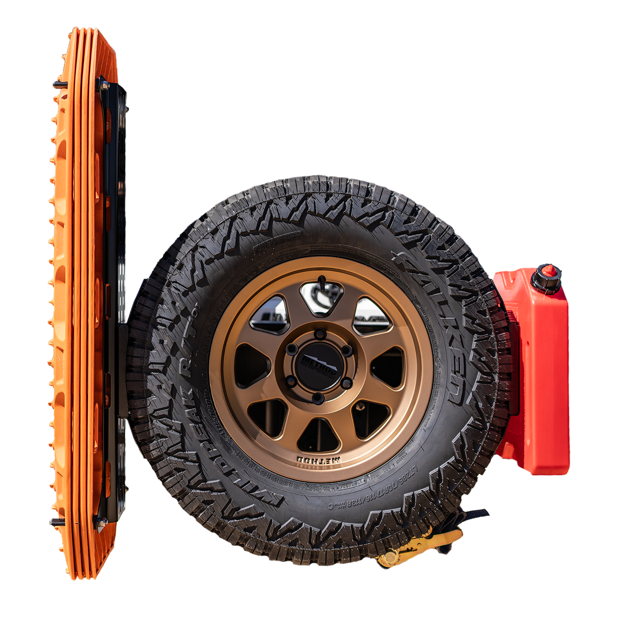 A spare tire mounting system designed for carrying MAXTRAX recovery boards, shown with rotopax