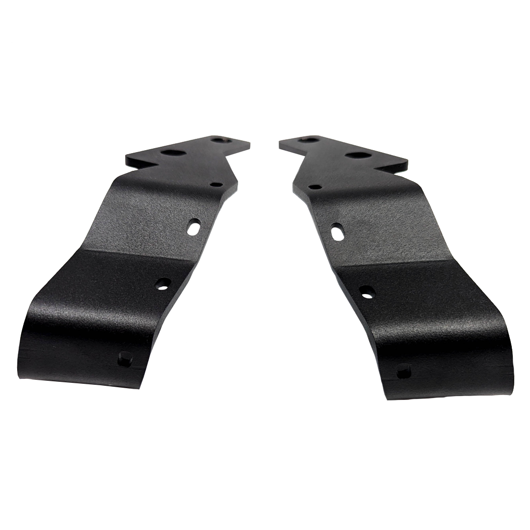 Pair of black ditch light brackets lying flat on a black background