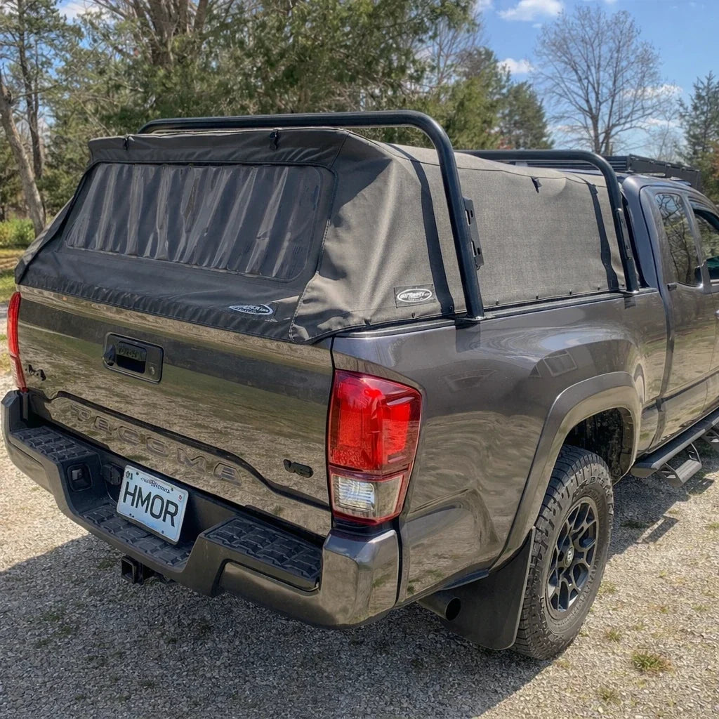 Tacoma with Softopper bed cover under tall HMOR bed bars